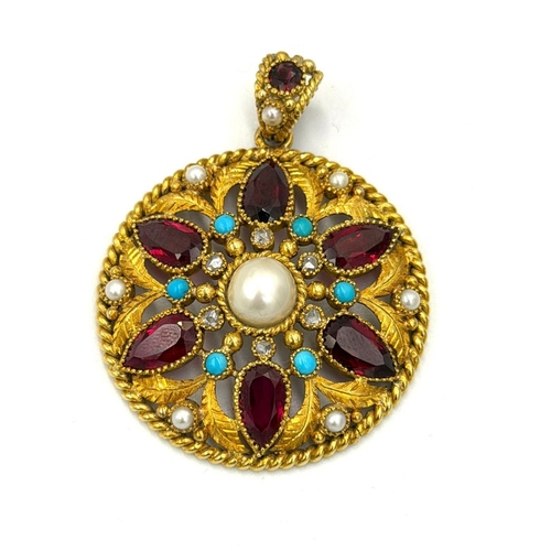 597 - A fabulous multi gem stone circular pendant with an approximate weight of 24g, 45mm diameter, set wi... 