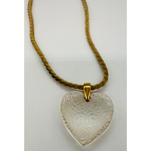 603 - A Lalique heart on a fabric rope style necklace