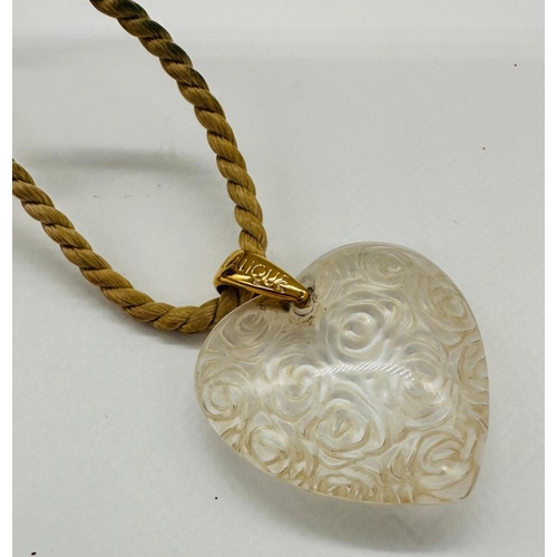 603 - A Lalique heart on a fabric rope style necklace