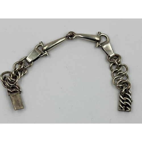 614 - A Sterling silver horse bit bracelet, hallmarked to clasp.
