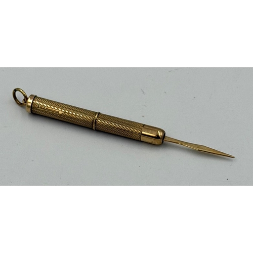 617 - A 9ct gold extendable toothpick, approximate weight 6.6g