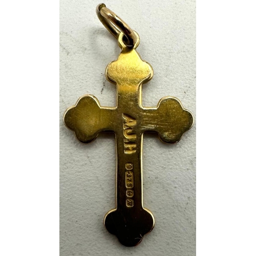 619 - A 9ct gold cross pendant 0.5g
