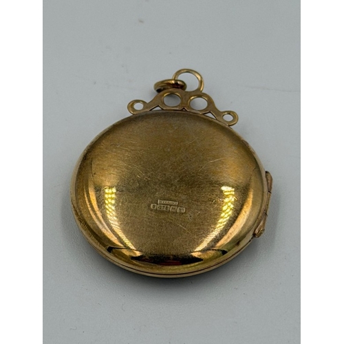 620 - A 9ct gold locket with floral decoration approximate total weight 8.1g