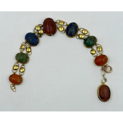 622 - Vintage Egyptian Revival bracelet featuring carved stones set in gold
