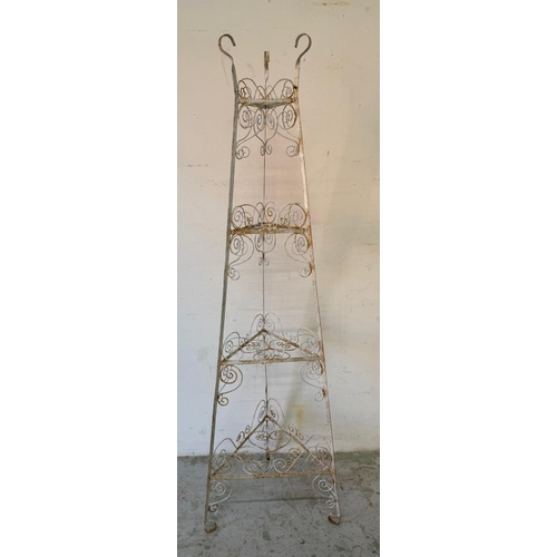 A white painted wrought-iron three tier corner plant stand