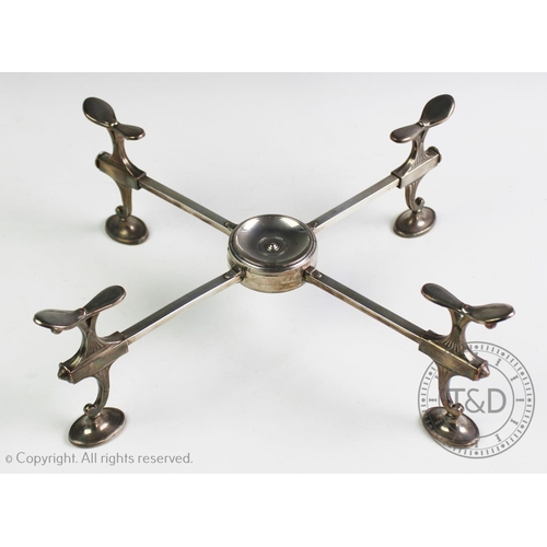 100 - A 19th century silver plated folding dish stand, with petal shaped dish supports, on reeded oval fee... 