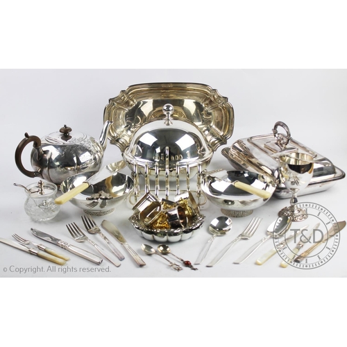 105 - A large collection of silver plated items to include; Community plate cutlery, a four piece tea serv... 