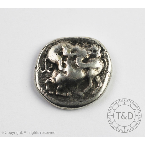 108 - An Ancient Greek tetradrachm coin, Acanthus circa 400BC, lion attacking a bull recto and Quadriparti... 