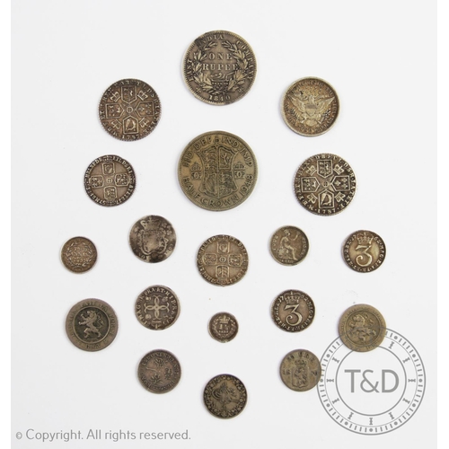 109 - A selection of 18th century and later British and continental silver and white metal coins to includ... 