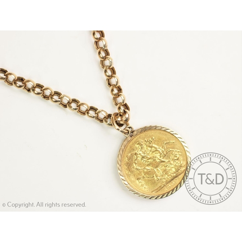 114 - An Edwardian gold sovereign dated 1907, within 9ct gold mount, with attached 9ct gold belcher link c... 