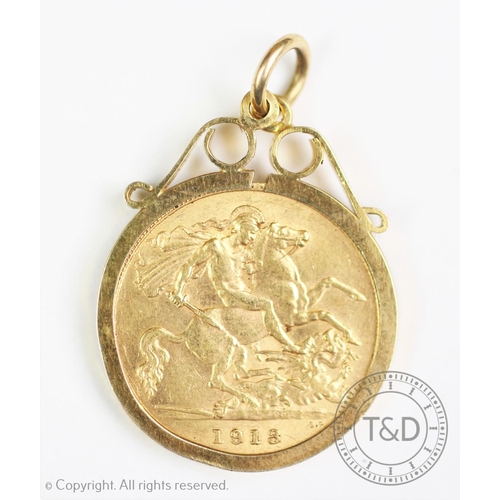 116 - A George V gold half sovereign dated 1913, within a 9ct gold mount, gross weight 5.3gms