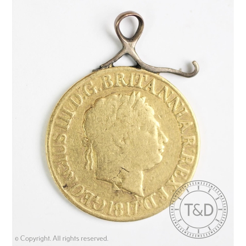 124 - A George III gold sovereign dated 1817, with attached soldered mount, gross weight 8.02gms