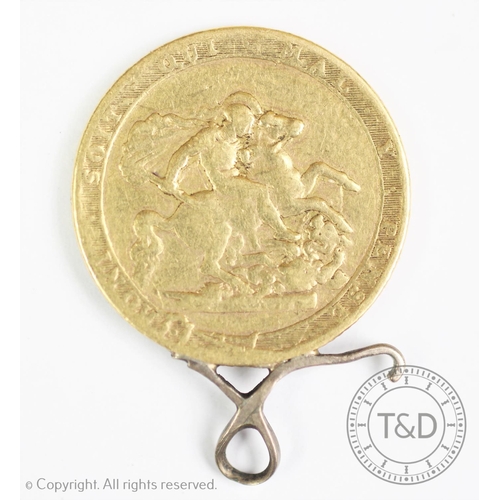 124 - A George III gold sovereign dated 1817, with attached soldered mount, gross weight 8.02gms