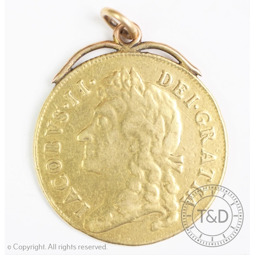 125 - A James II gold two guineas dated 1687 with mount, 13mm diameter, gross weight 16.95gms