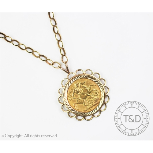 126 - A Victorian gold sovereign dated 1900, within 9ct gold mount and with attached 9ct belcher link chai... 