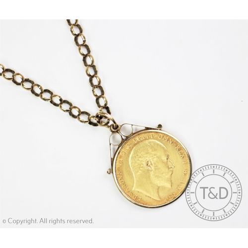 127 - An Edwardian gold sovereign dated 1908, within 9ct gold mount, on a 9ct gold belcher link chain and ... 