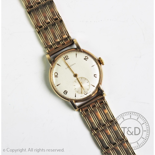 167 - A gentlemen's Longines 9ct gold wristwatch, the circular face with Arabic and arrow head dial with s... 