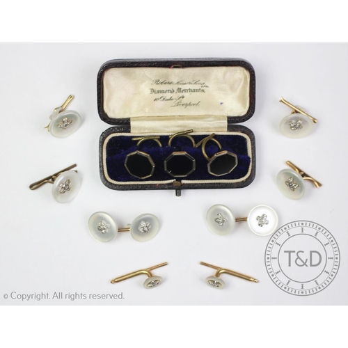 169 - A gentleman's mother of pearl and diamond set dressing set, each designed as a central cross of five... 