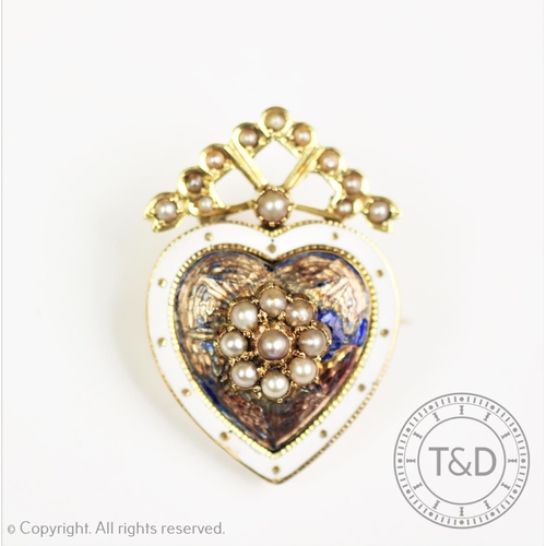 191 - A Victorian heart shaped memorial brooch, designed as a central seed pearl floral cluster, within a ... 