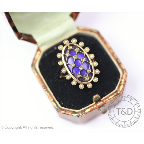 263 - An enamel pearl and rose cut diamond set ring, designed as an oval panel enamelled in blue, with tre... 