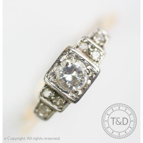 289 - An Art Deco diamond set ring, Birmingham 1944, the central diamond within a white metal square setti... 