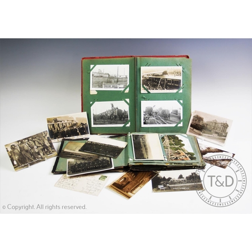 342 - Two early 20th century postcard albums, containing approximately one hundred and seventy postcards, ... 