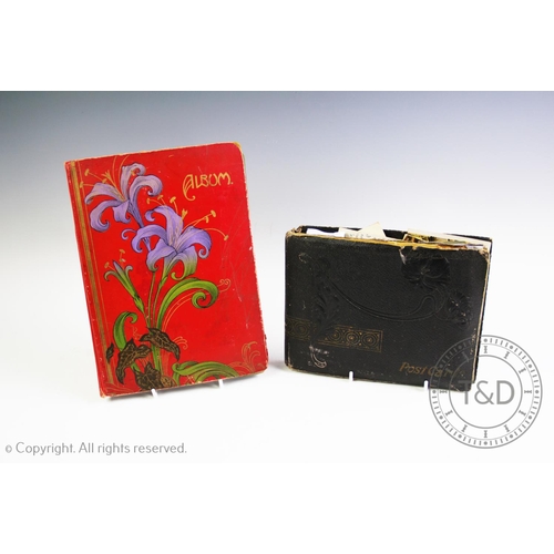 342 - Two early 20th century postcard albums, containing approximately one hundred and seventy postcards, ... 