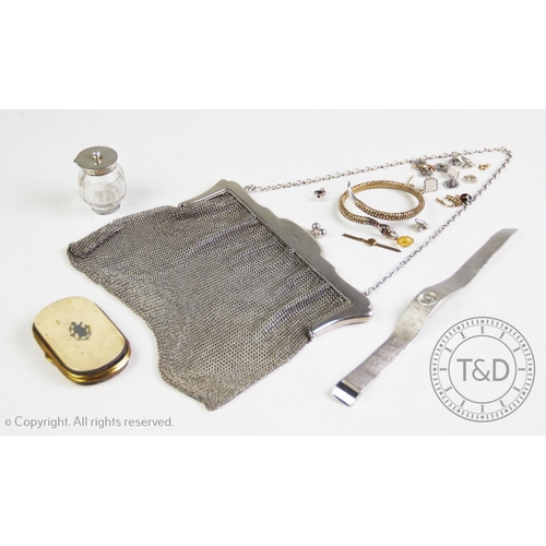 75 - A silver mounted, mesh evening bag, London Chain Bag Co, London 1917, with a coin purse, a Montine w... 