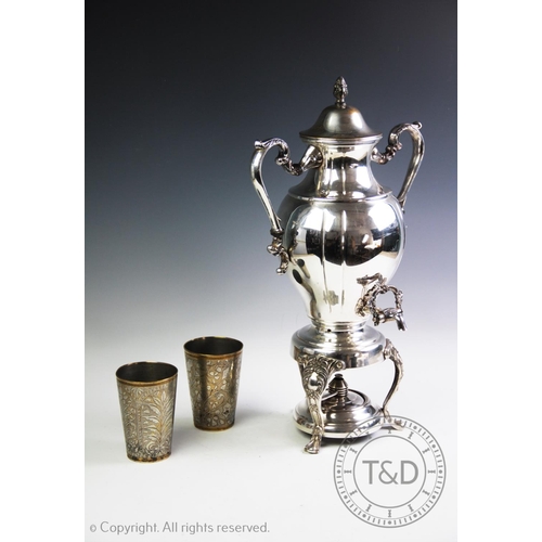 94 - A silver plated samovar with cover and spirit burner, 51cm high, together with two white metal beake... 