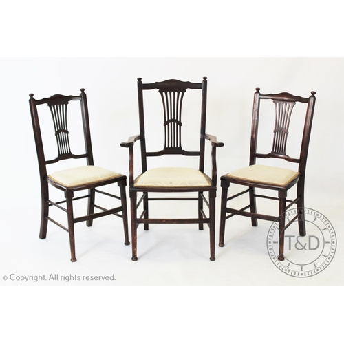 946 - A set of six Edwardian stained beech wood chairs, each with a pierced splat back and a padded seat, ... 