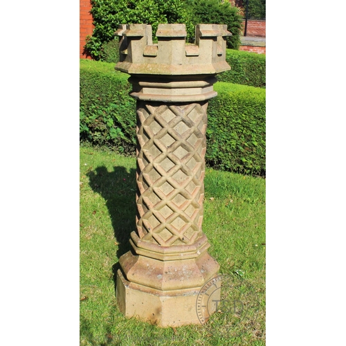 970 - A large crown top chimney pot by Farnley & Co, with moulded lattice detail to the column, 128cm high