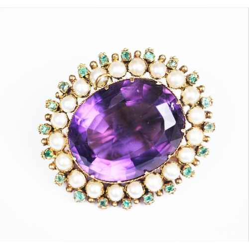 177 - An early 20th century brooch in Suffragette colours, designed as a central claw set amethyst, within... 