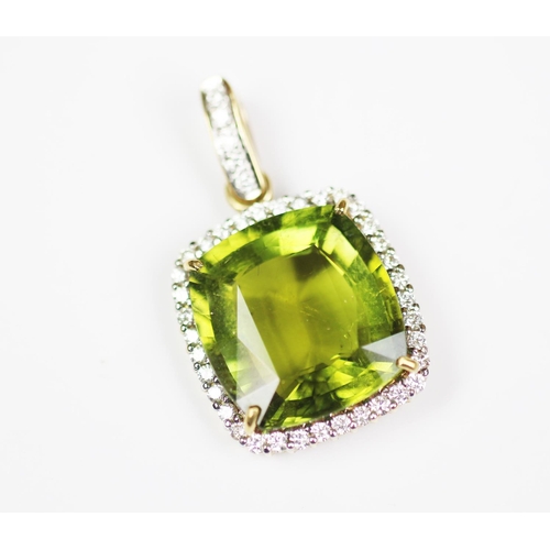 185 - A 'Cuprian' tourmaline and diamond set pendant, the cushion cut tourmaline, within four claw setting... 