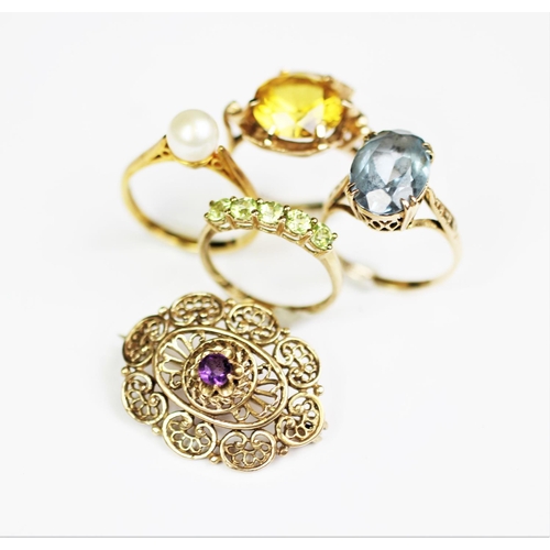 261 - A selection of jewellery and rings, to include; a topaz ring, a citrine set ring, a five stone perid... 