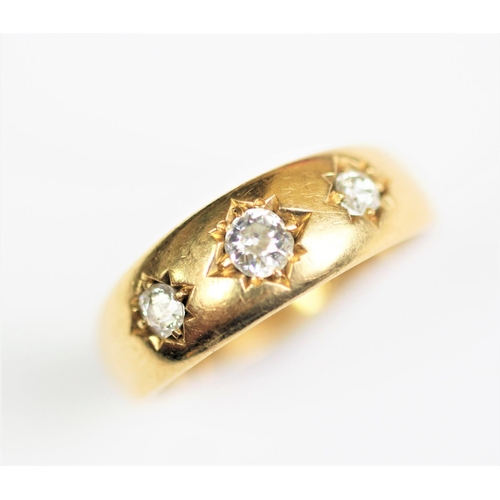 279 - A three stone diamond ring, early 20th century, the three graduated old brilliant cut diamonds, all ... 