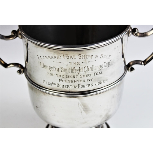 1 - A George V two handled silver presentation trophy, Chester 1912, of plain polished band design, with... 