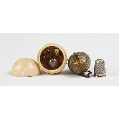 329 - A 19th century ivory etui, the ovoid egg shaped case with screw cover opening to reveal a compartmen... 