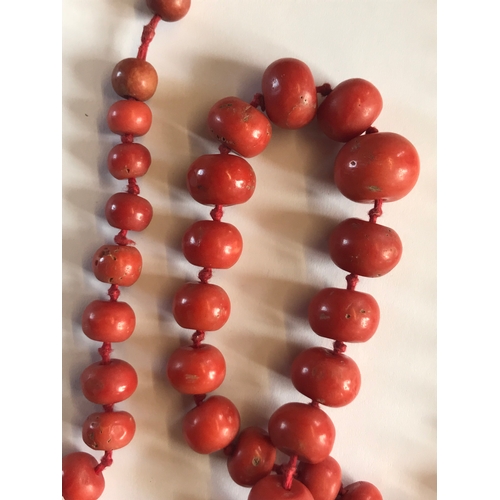 206 - A Victorian coral bead necklace, the fifty five graduated beads upon knotted string and with attache... 