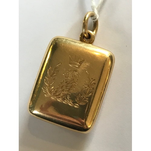 252 - A Victorian crested locket, designed as a rectangular bi-fold pendant enclosing four apertures conta... 