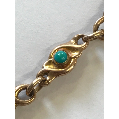 243 - A Victorian turquoise set bracelet, designed as five oval links depicting lilies, interspersed with ... 