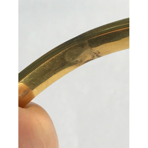 257 - A 9ct yellow gold slave bangle, 10cm diameter, weight 16.8gms, along with another similar example of... 