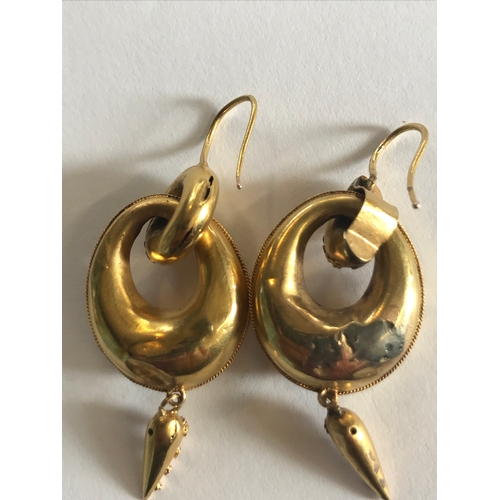 244 - A pair of Victorian drop earrings, designed as interlocking hoops decorated with delicate cannetille... 