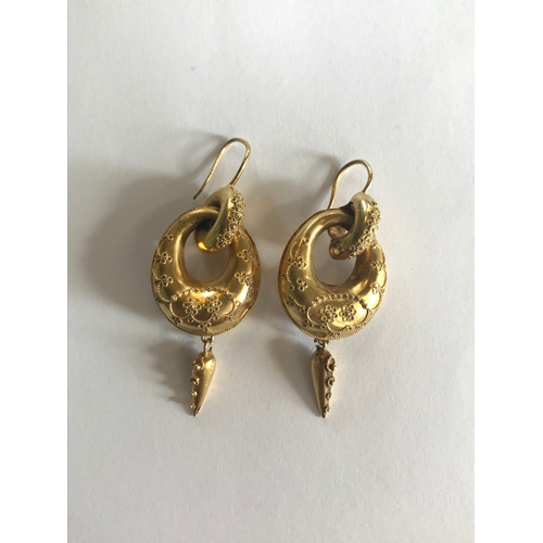 244 - A pair of Victorian drop earrings, designed as interlocking hoops decorated with delicate cannetille... 