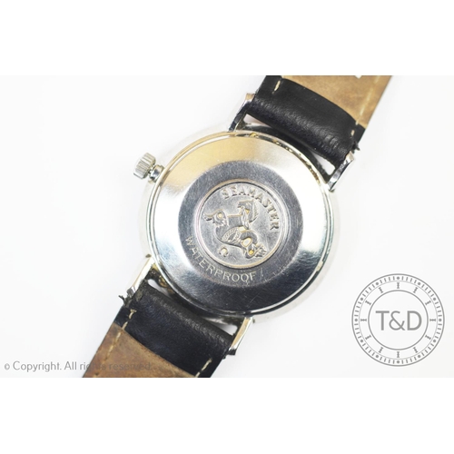 103 - A gentleman's Omega De Ville Seamaster wristwatch, the silvered face with baton markers and date ape... 