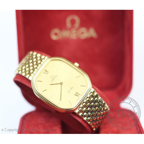 105 - An Omega De Ville wristwatch, the octagonal gilt dial with baton markers, gold plated case 28mm wide... 