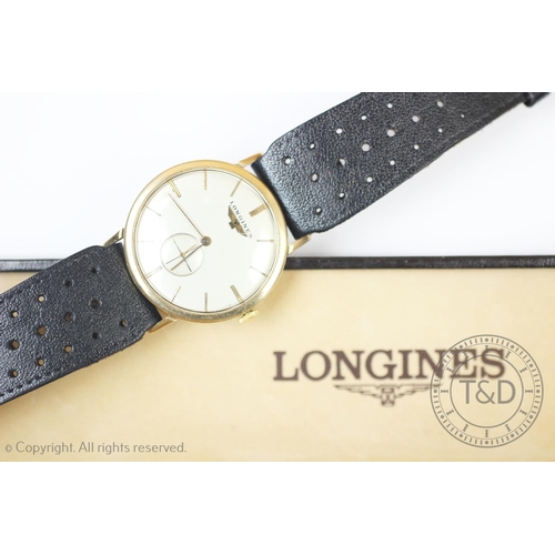 106 - A Longines 9ct gold wristwatch, the circular white dial with gold toned baton markers and subsidiary... 