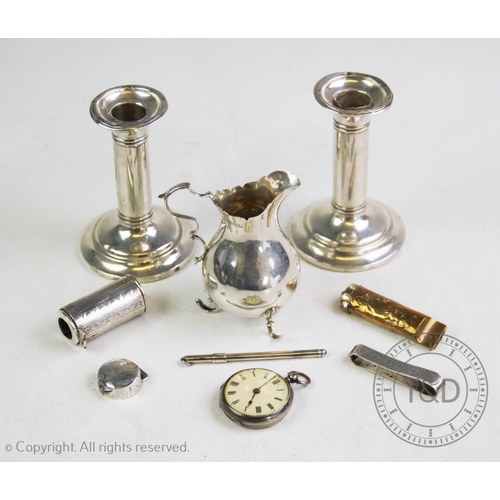 15 - A selection of 20th century and earlier silver and silver coloured items, comprising: a pair of Edwa... 