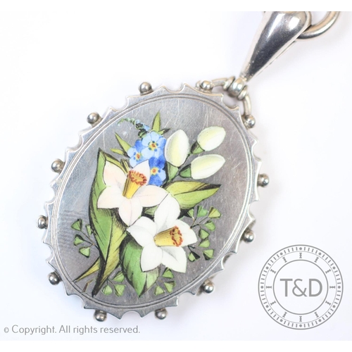 152 - A Victorian sentimental locket and collarette, the white metal oval locket with delicate enamelled n... 