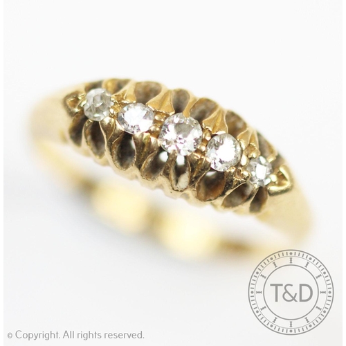 233 - A five stone diamond ring, early 20th century, the five graduated diamonds all claw set in 18ct yell... 