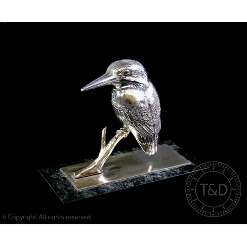 43 - A white metal model of a kingfisher, mounted on a silver base plate, plate hallmarked London 1980, a... 
